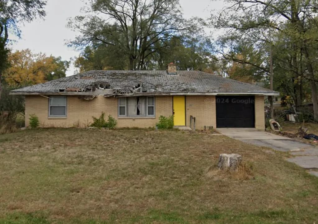 Abandoned house purchased for cash with no cleanout required from the seller
